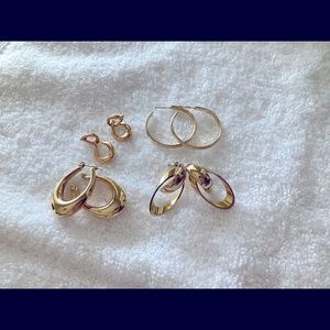Four pairs of pierced earrings